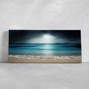 Coastal canvas prints featuring a peaceful, stormy ocean landscape.