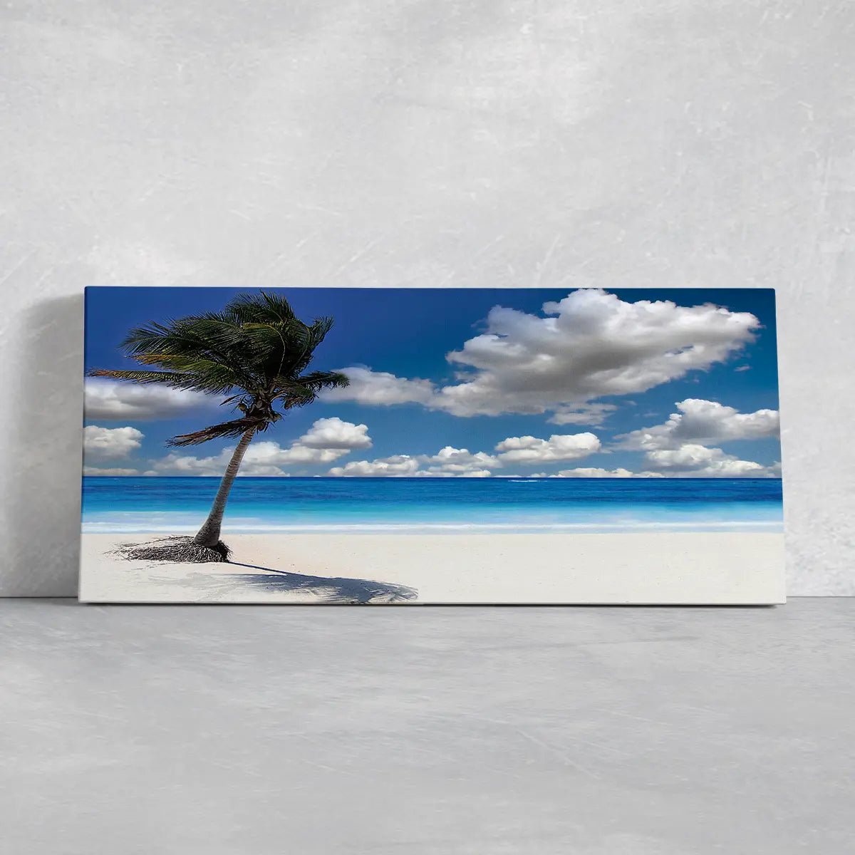 Coastal beach wall art with a vibrant palm tree and turquoise water.