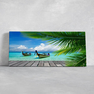 Serene beach sunset painting with boats on crystal-clear waters, perfect for warm decor.