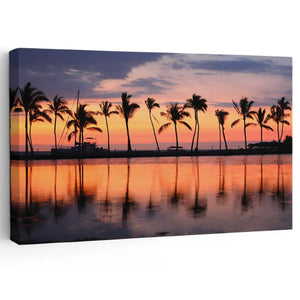 Beach landscape artwork featuring a row of palm trees against a sunset sky.