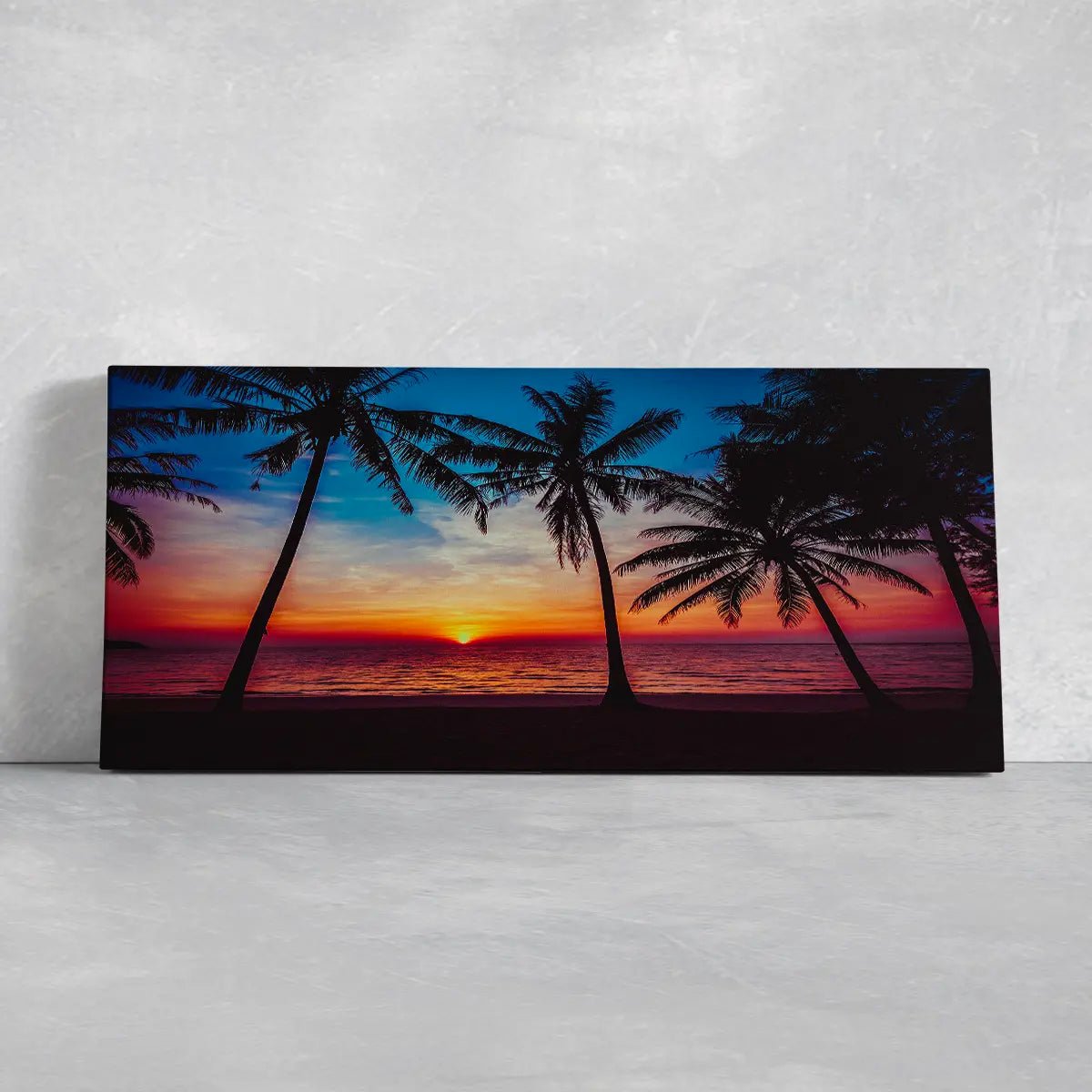 Large beach canvas wall art with ocean waves and a warm sunset.