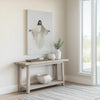 Modern Christian watercolor art of Jesus depicted with soft brush strokes in a minimalist entryway above a neutral console table, enhancing the welcoming ambiance.