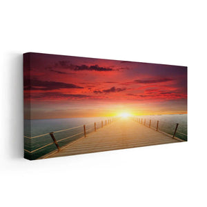 Framed beach artwork prints featuring a serene dock leading to the glowing sun.