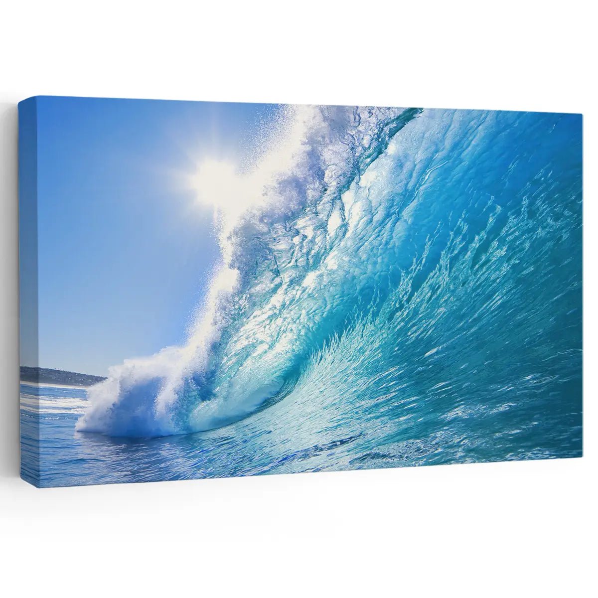 Ocean canvas print featuring a powerful curling wave under a bright blue sky.