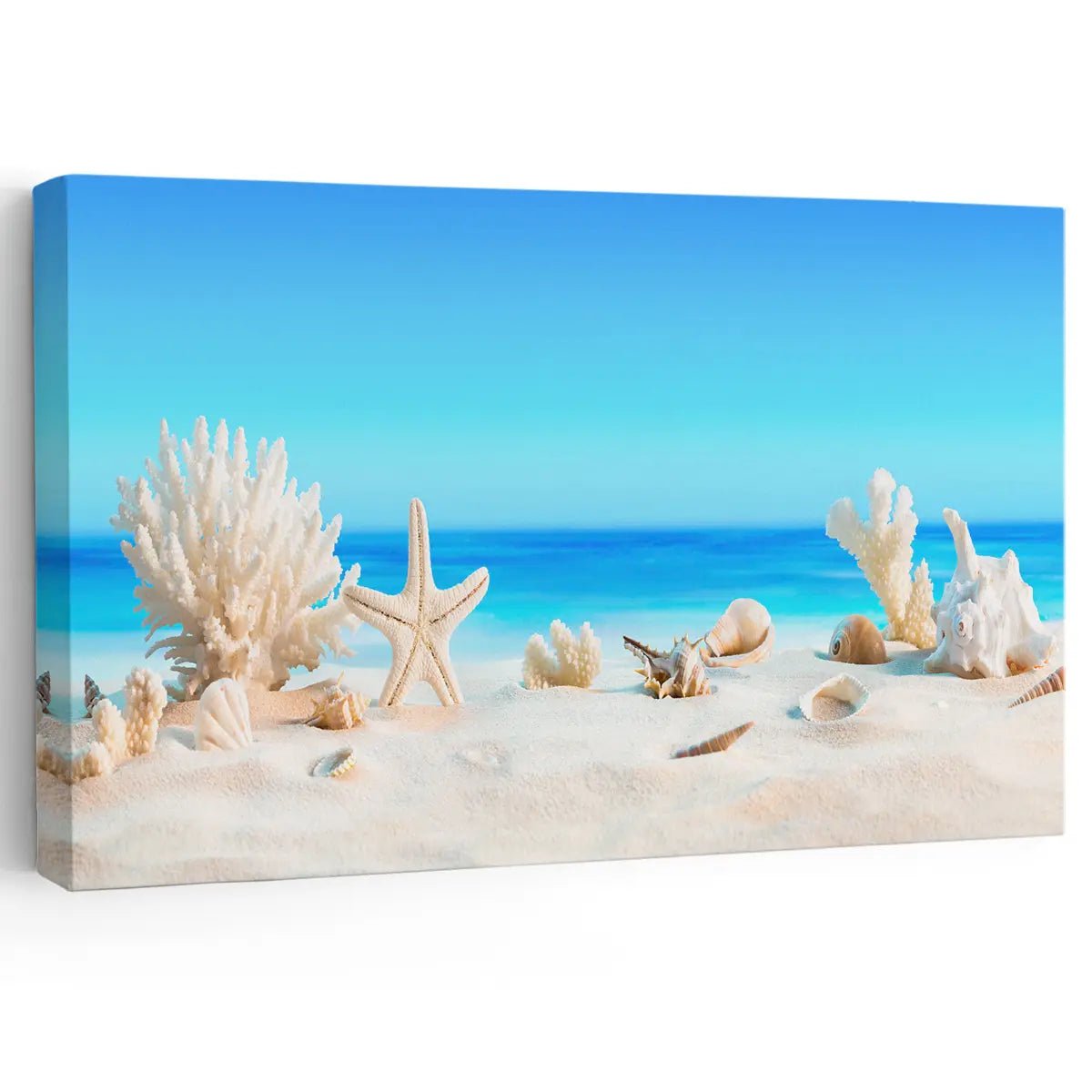 Coastal beach wall decor featuring seashells, coral, and starfish on soft sand with a blue ocean canvas