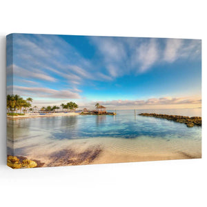 Large beach wall art featuring a serene Bahamas paradise with crystal-clear waters and a thatched-roof pier.