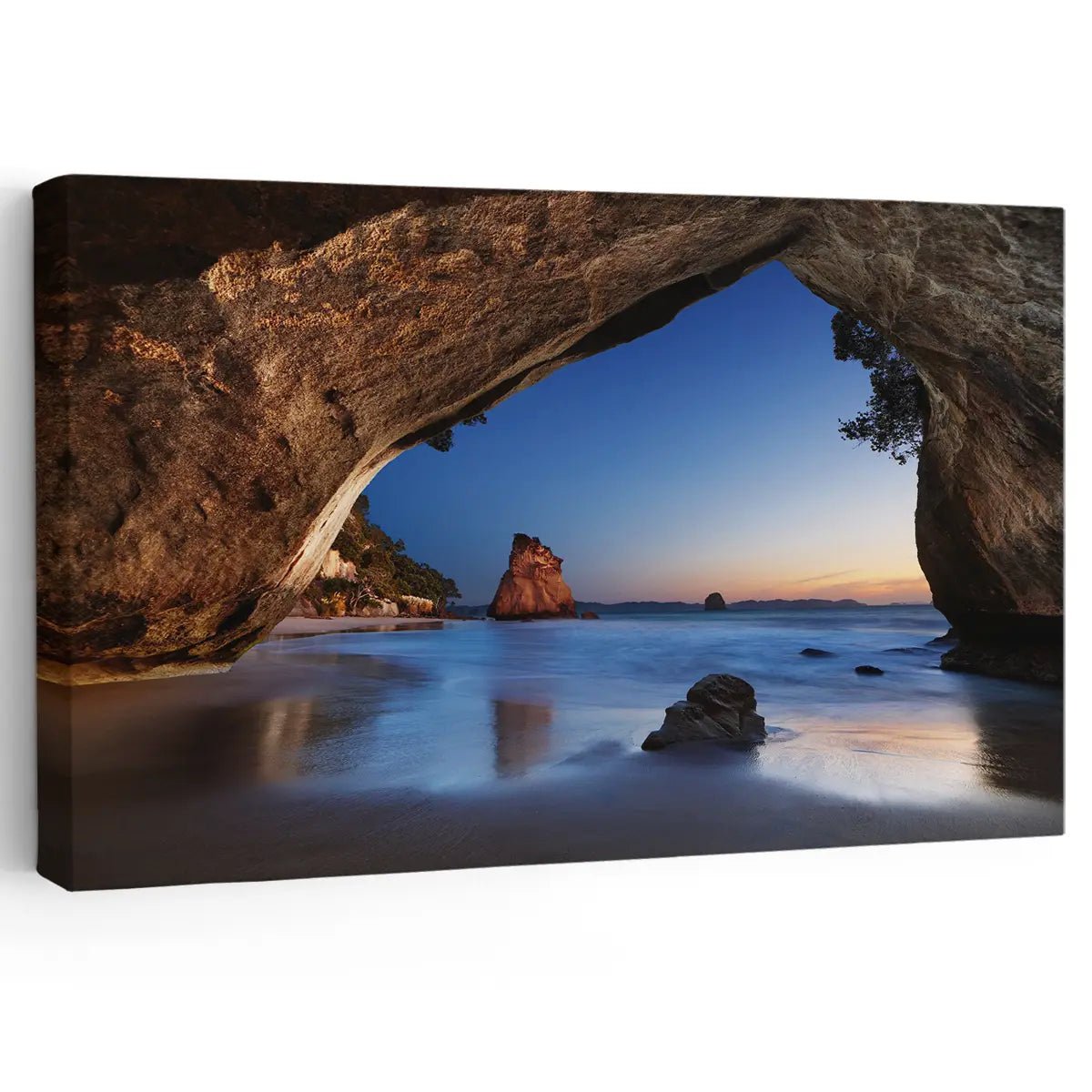 Large beach wall art featuring a stunning view of Cathedral Cove at sunrise, framed by a natural rock arch.