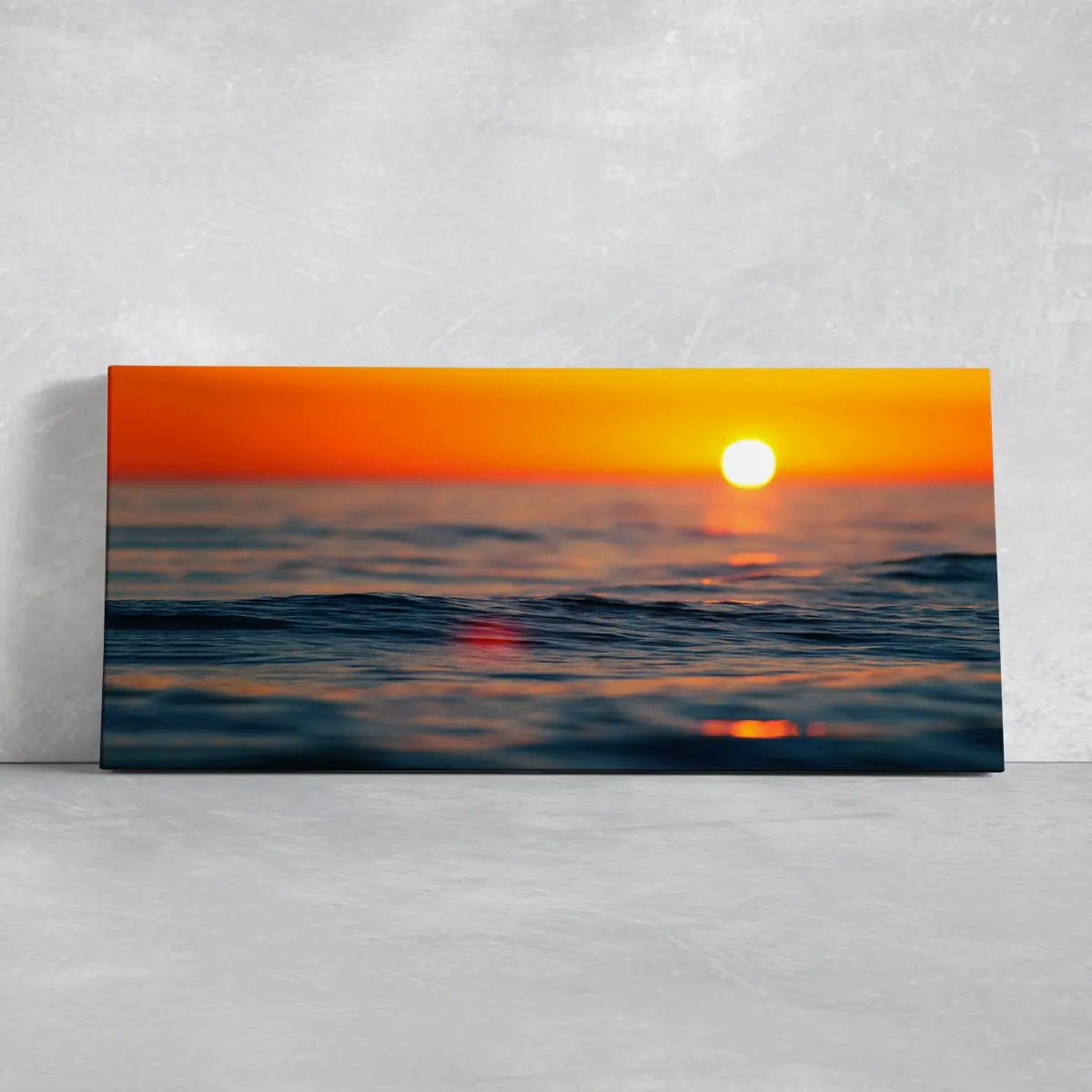 Sunset beach artwork highlighting ocean ripples in soft golden hues.