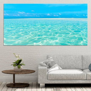 Ocean beach artwork on canvas with clear blue waters.