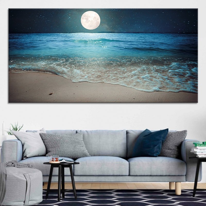 Coastal beach wall decor with a glowing moon over the sea, creating a soothing atmosphere for beach house decor.