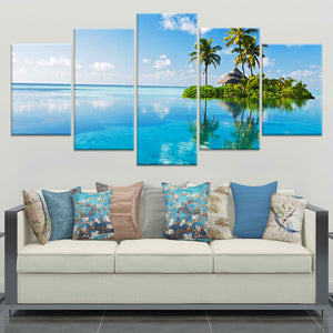 Beach wall art for living room featuring a breathtaking tropical ocean view with lush greenery and blue skies.