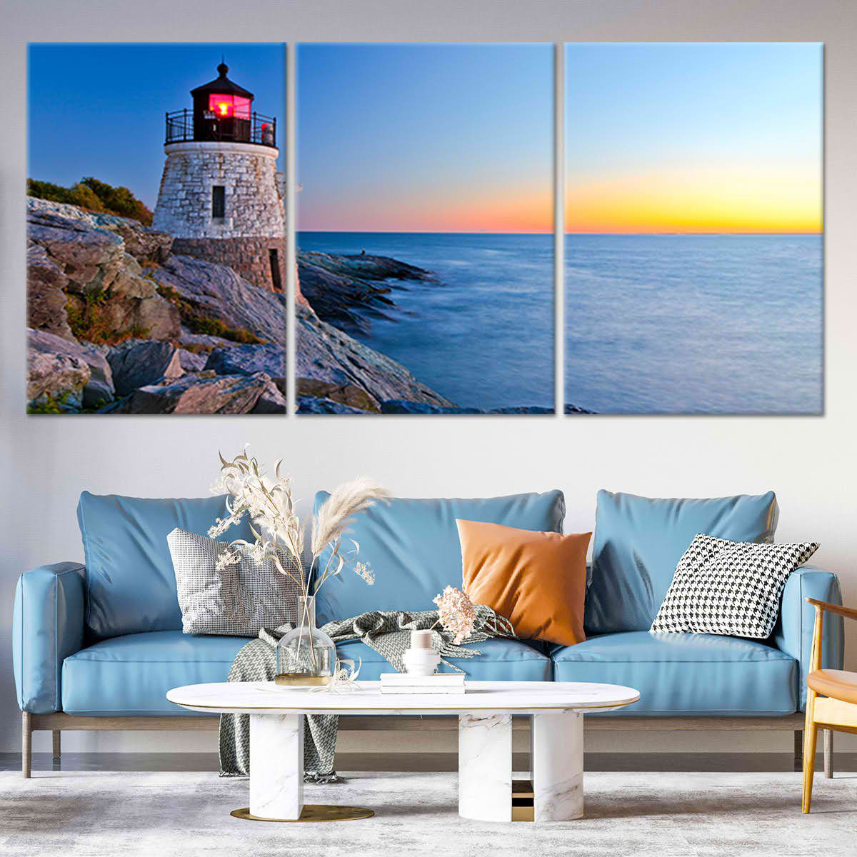 Extra large ocean wall art showcasing a historic lighthouse perched on rocky cliffs with a glowing sunset sky.