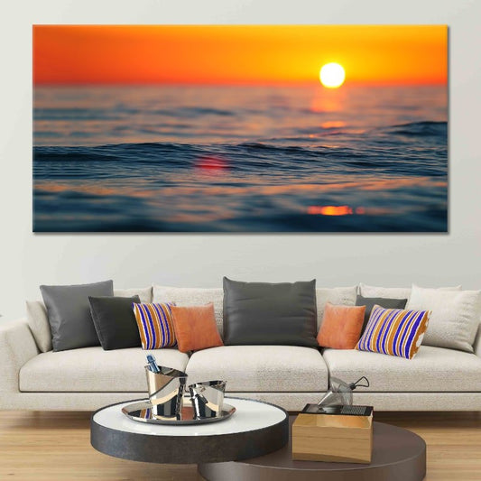 Beach print art with an ocean horizon and warm sunset reflections.