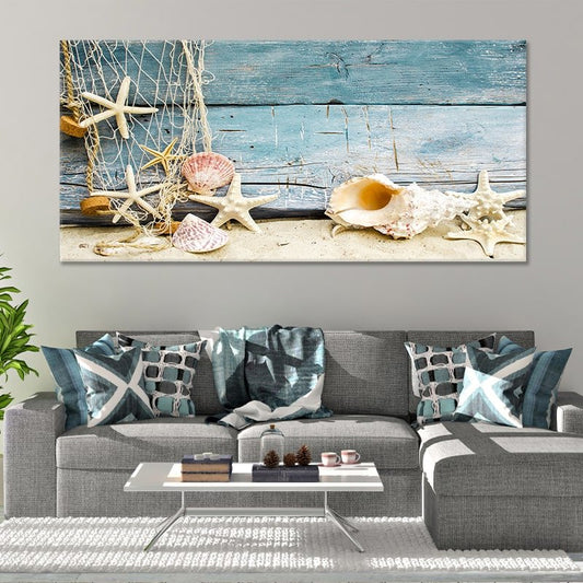 Coastal canvas prints with seashells and starfish for a serene beach aesthetic.